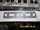 http://i1251.photobucket.com/albums/hh543/fifermanky/INLET%20MANIFOLD/MANIFOLDGASKETSTARTINGTOBEMODIFIED.jpg