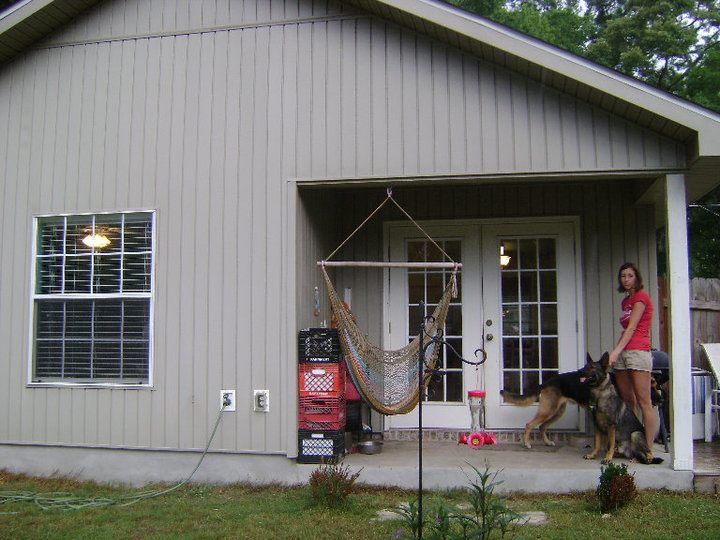The back porch with the previous owner and her huge dogs