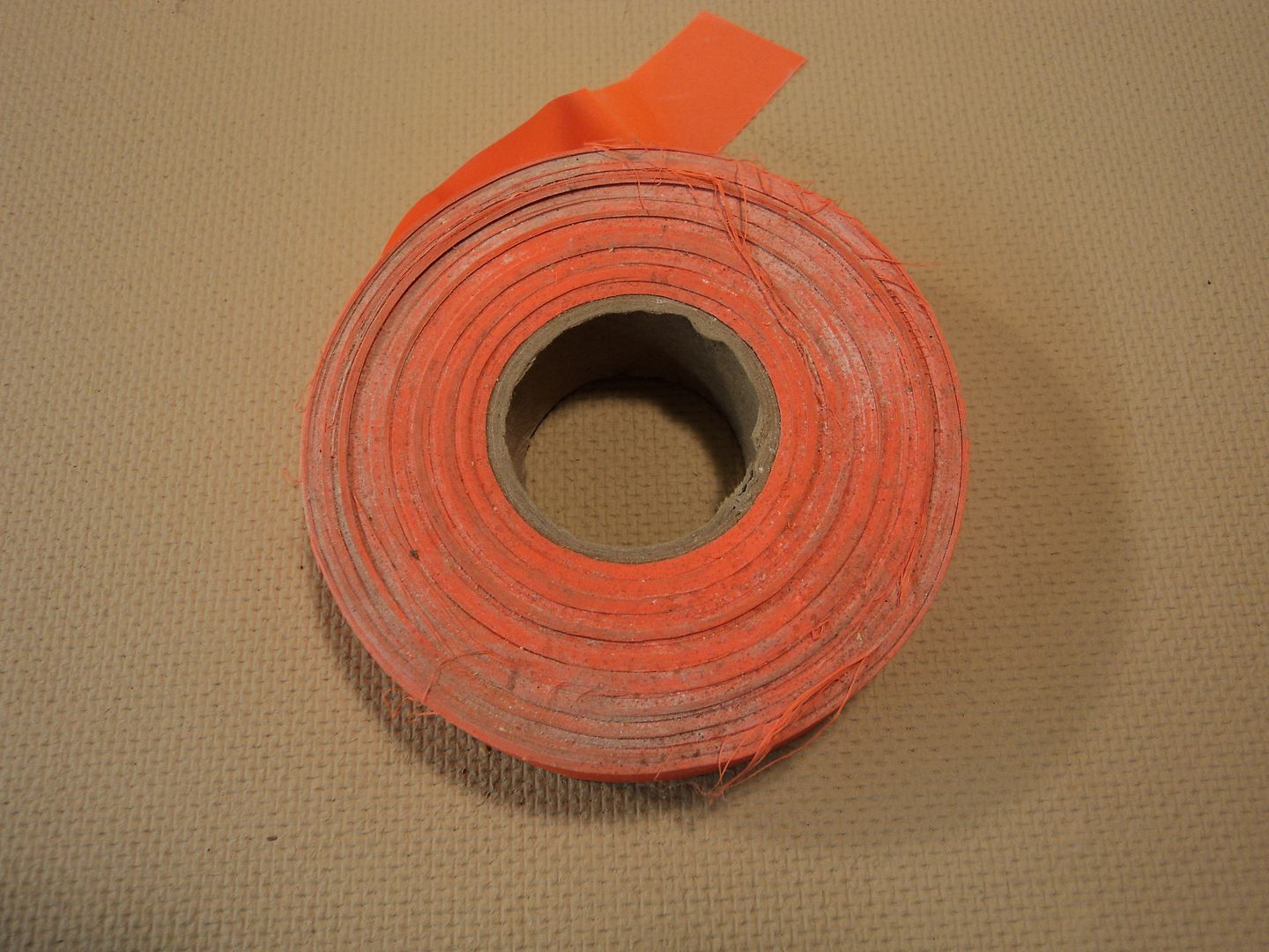 Standard Caution Tape 4 1/4in Diameter x 1in H Safety Orange Plastic